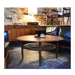 Round Danish Coffee table with Rattan Shelf